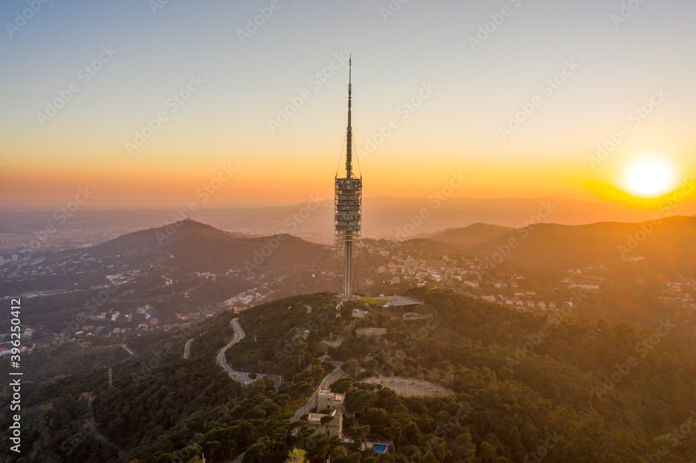 Radio tower on top of Mount Tibidabo near Barcelona during sunset