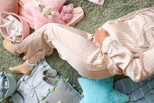 Beautiful pregnant woman ly...