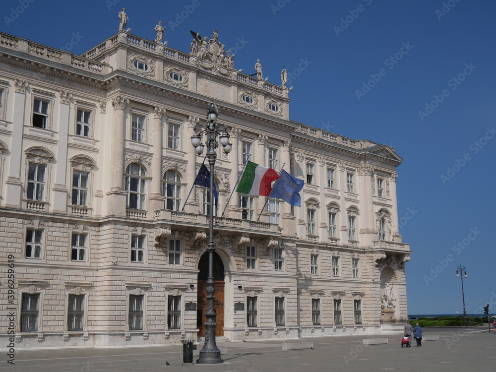 Palace of Lloyd in Piazza Unità d'Italia in Trieste, decorated with allegorical statues on the ground floor and on the pediment