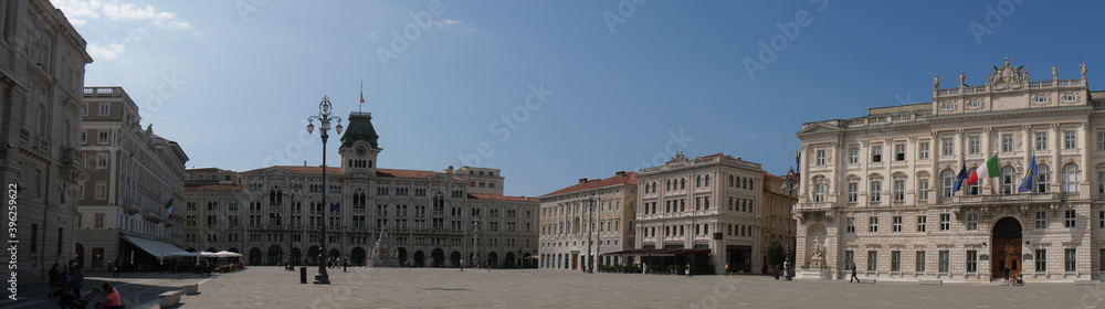 Piazza Unità d'Italia in Trieste, surrounded by numerous buildings like Palace of Lloyd, Palace of the Austrian Lieutenancy and with the Town Hall in the background