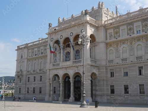 Palace of the Austrian Lieutenancy in Piazza Unità d'Italia in Trieste, with the facade decorated with mosaics with the coats of arms of the Savoy house © filippoph