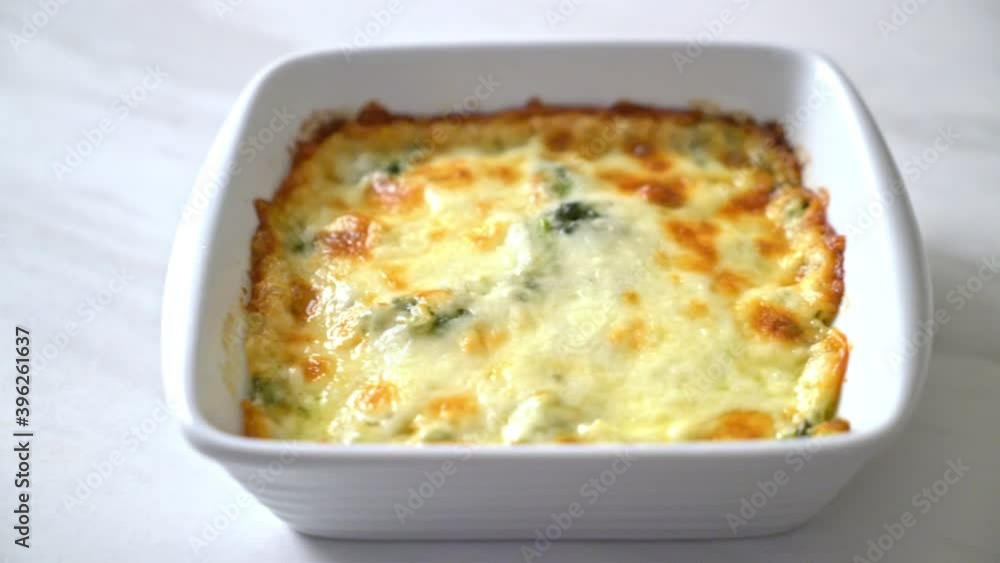 baked spinach lasagna with cheese in white plate baked spinach lasagna with cheese in white plate