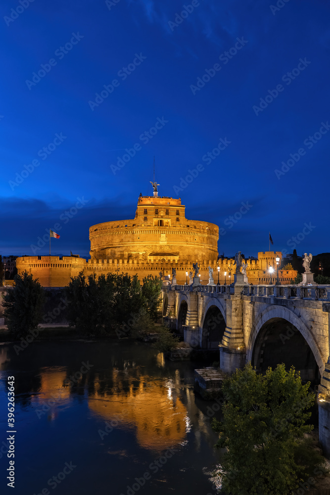 City of Rome by night in Italy, Castel Sant Angelo - ancient Mausoleum of Hadrian and St Angelo Bridge on Tiber River