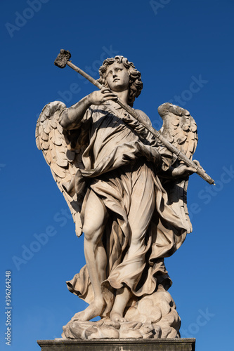 Angel with the Sponge on Ponte Sant Angelo bridge in Rome, Italy. Marble sculpture from 17th century by Antonio Giorgetti, design of Bernini