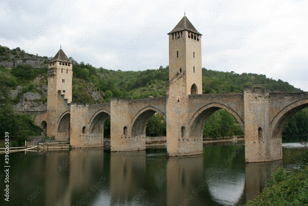 valentré bridge and river lot in cahors (france) valentré bridge and river lot in cahors (france)