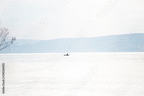 Fishing with a fishing rod in the center of the Sea of Galilee. Lake Tiberias, Kinneret, Kinnereth. High quality photo