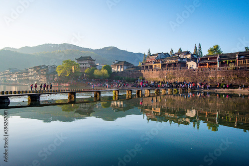 Street view local visitor and tourist atFenghuang old town Phoenix ancient town or Fenghuang County is a county of Hunan Province, China