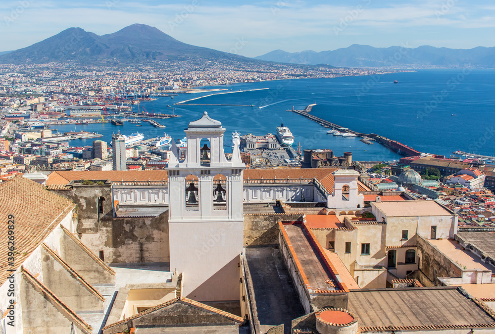 Naples, Italy - a former monastery complex, and now a museum, the Certosa di San Martino is perched atop the Vomero hill. Here the complex with Mount Vesuvius on the background