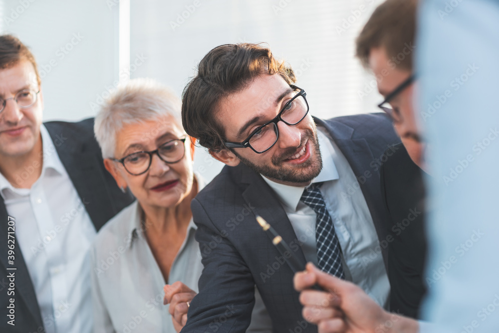 close up. smiling business colleagues discussing new ideas close up. smiling business colleagues discussing new ideas