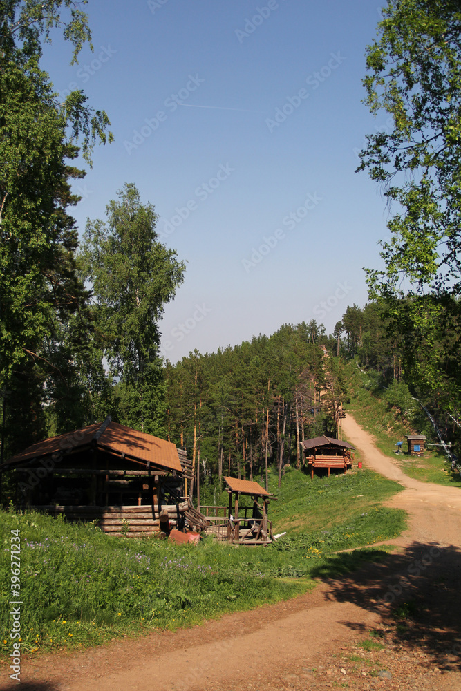 hut a house of logs in the forest of Krasnoyarsk
