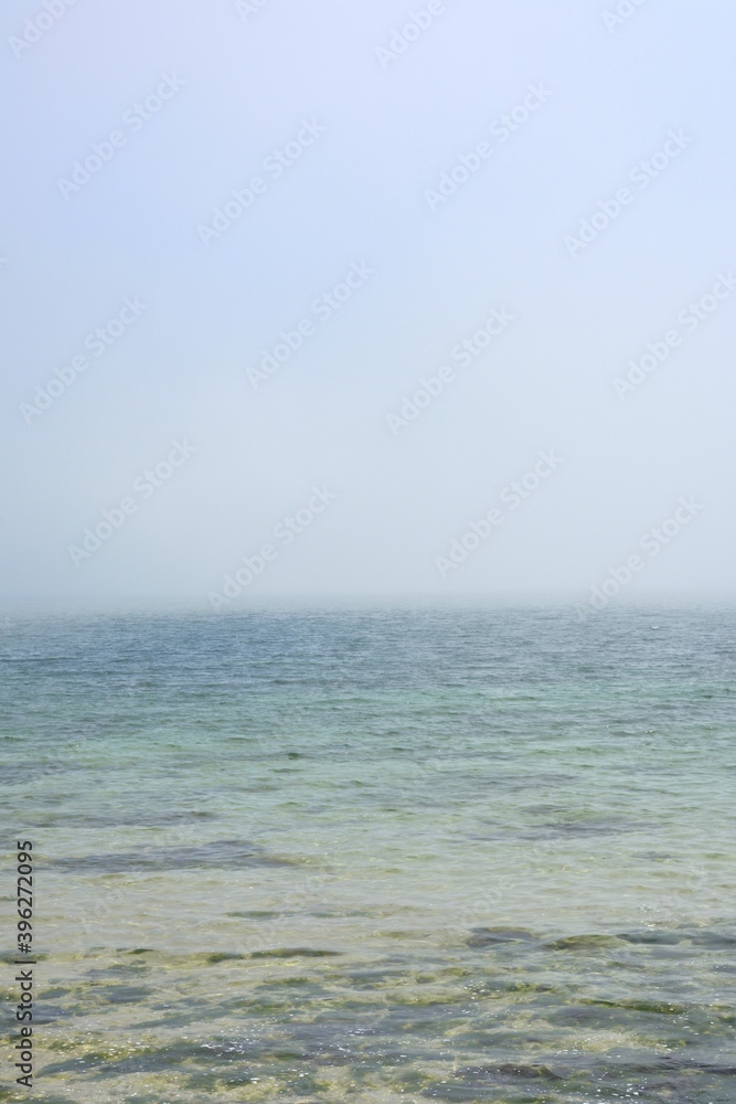 Ravda, Bulgaria. May, 20, 2014. Sea mist. water surface covered with aerozole. Foggy seashore defocused blurry background