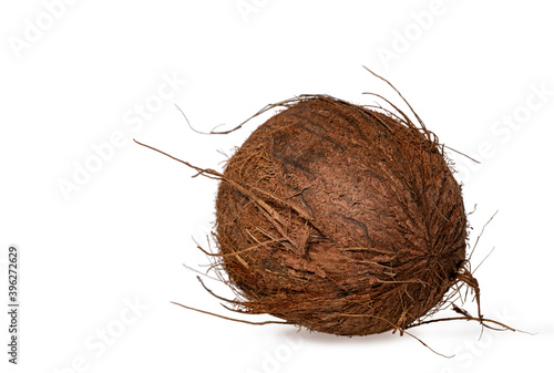 Side detailed view of whole coconut. Isolated on white background.