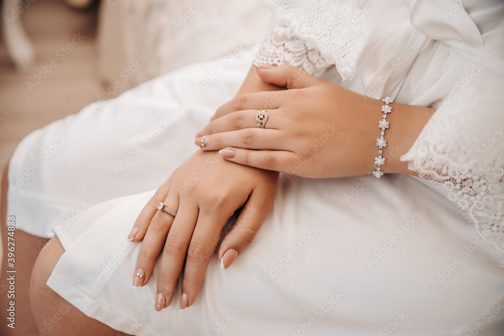 Hands with a beautiful nude manicure Hands with a beautiful nude manicure
