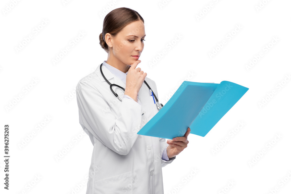 medicine, profession and healthcare concept - thinking female doctor in white coat with folder and stethoscope medicine, profession and healthcare concept - thinking female doctor in white coat with folder and stethoscope