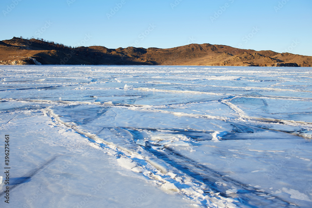 Beautiful landscape of frozen Lake Baikal. Small Sea Strait in winter sunny frosty winter day. Beautiful landscape of frozen Lake Baikal. Small Sea Strait in winter sunny frosty winter day.