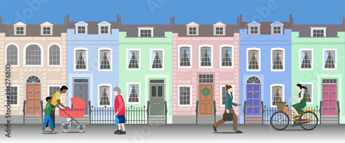 People life on a city street with colorful houses. Brittish georgian architecture.