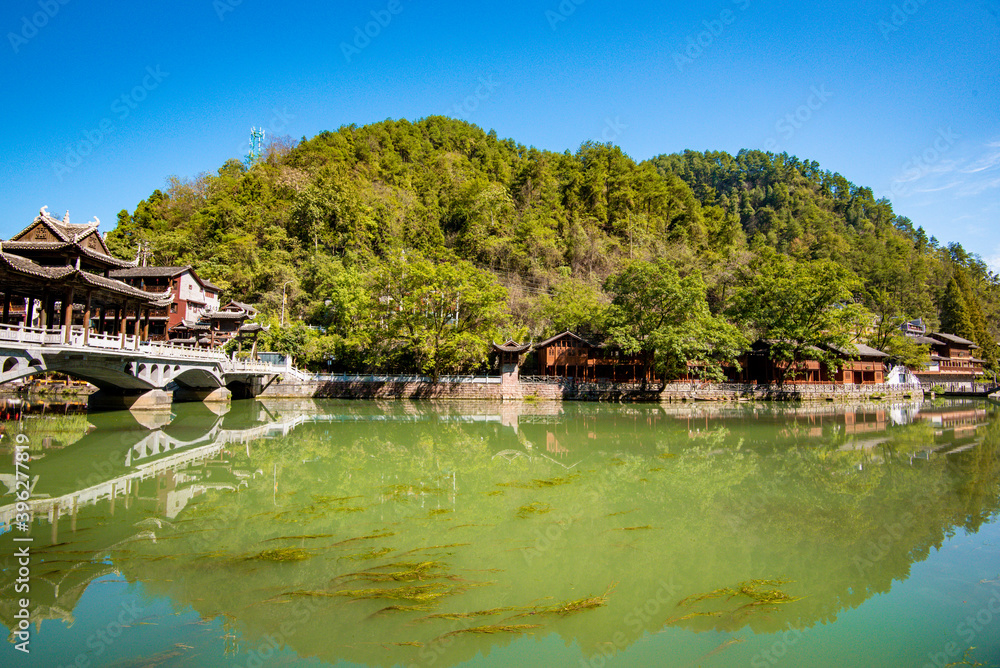 Scenery of old houses in Fenghuang City, Hunan Province, China. The ancient city of Fenghuang is regarded by UNESCO as a World Heritage Site. Scenery of old houses in Fenghuang City, Hunan Province, China. The ancient city of Fenghuang is regarded by UNESCO as a World Heritage Site.
