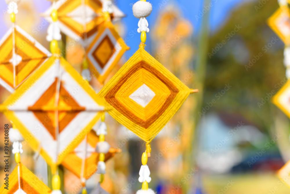 Hanging handmade hexagonal colorful knitting yarn flags. Colorful drape, Blown in the traditional Buddhist beliefs. In Thailand, Myanmar, Laos