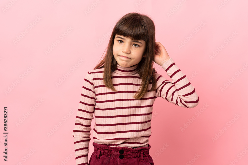 Little girl isolated on pink background having doubts Little girl isolated on pink background having doubts