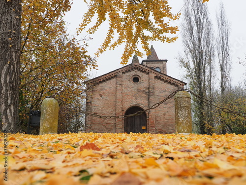 Copparo, Italy. Santa Maria di Savonuzzo Romanesque church, also called Pieve di San Venanzio. It was built in 1344 at the behest of the feudal lord Giovanni da Saletta. Foliage.