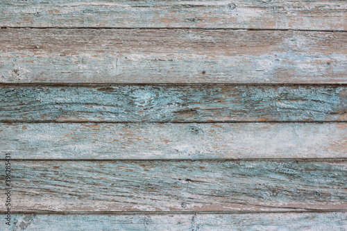 Wooden boards with old paint. Wooden background, texture