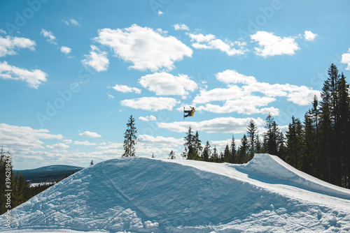 snowboarder jumping in the air photo