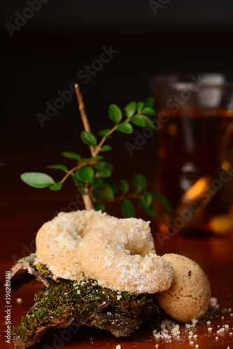 upright closeup of trditional austrian cookie so called Vanillekipfer on dark wooden background photo