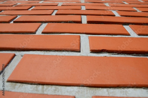 Red bricks on the wall of the house