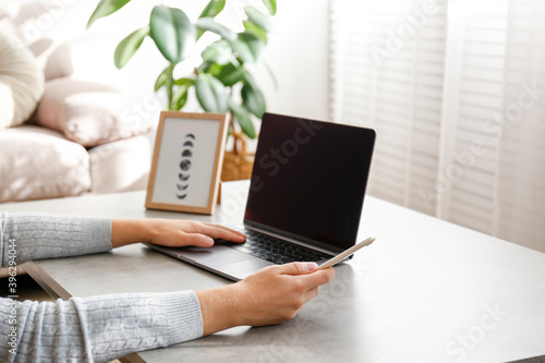 Wallpaper Mural Work from home concept. Cropped shot of woman's hands typing on laptop. Female freelancer working at her living room. Close up, copy space for text. Torontodigital.ca