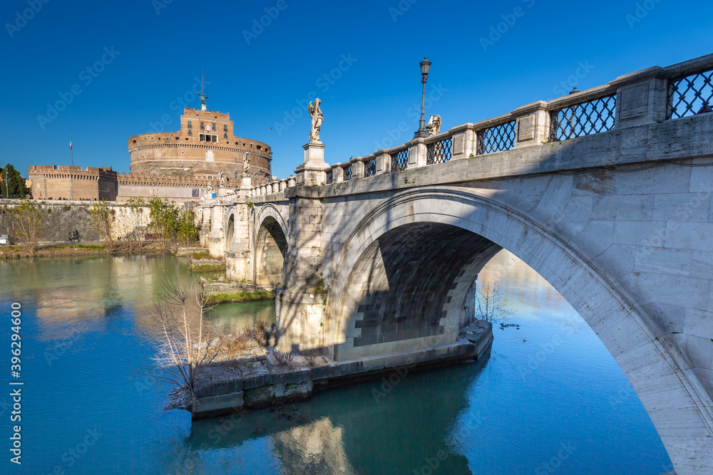 Bridge to the Saint Angel Castle over the Tiber river in Rome, Italy