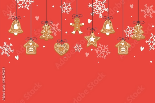 Christmas backgroung with hanging gingerbread cookies
