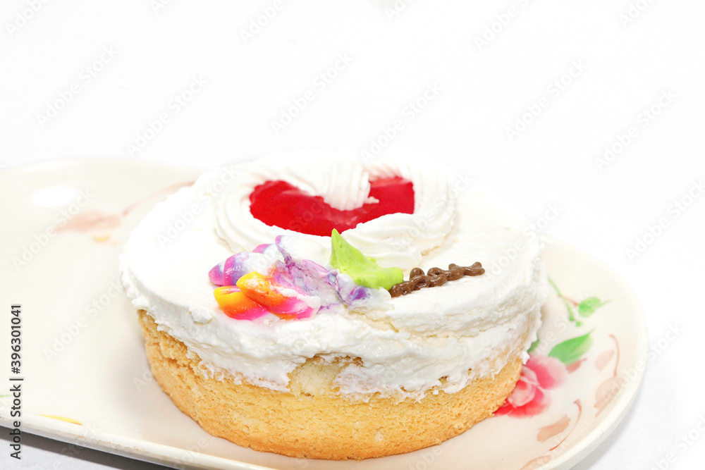 chiffon cake with jelly topped with whipped cream on a white background, fresh and fresh in a bakery that is ready to serve every festival around the world chiffon cake with jelly topped with whipped cream on a white background, fresh and fresh in a bakery that is ready to serve every festival around the world