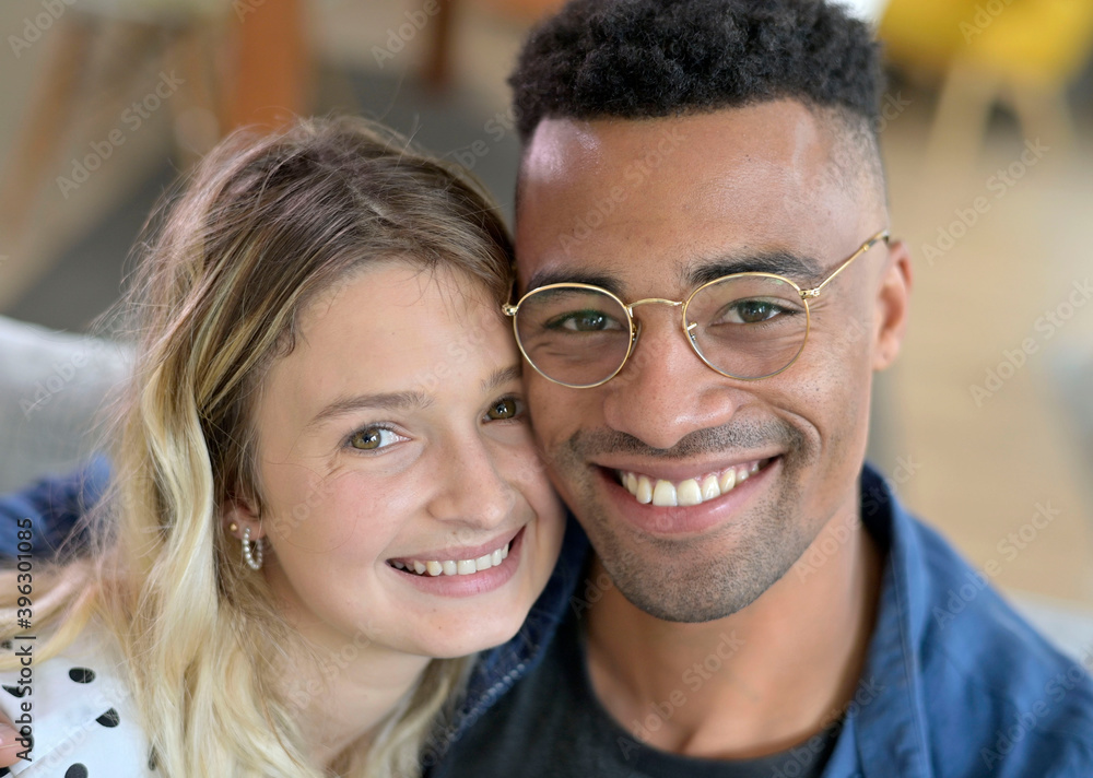 Portrait of cute 30-year old mixed-raced couple Portrait of cute 30-year old mixed-raced couple