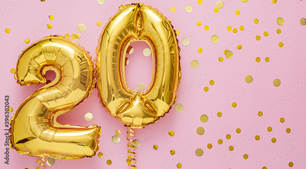 20 air balloon numbers on pink background. 20 k gold foil balloons with  confetti. Birthday party flat lay with copy space long web banner Stock  Photo | Adobe Stock