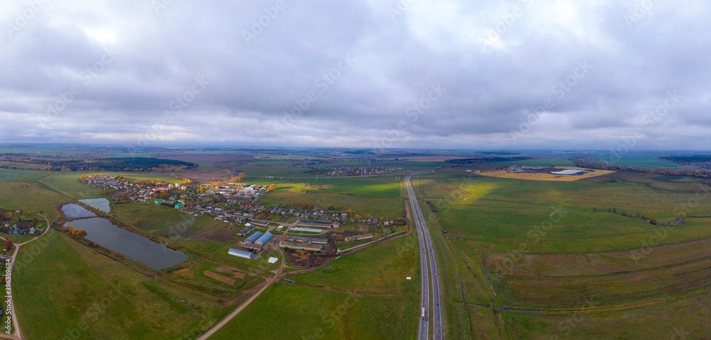 Aerial bird-eye view on freeway in autumn season