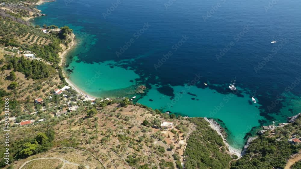 Aerial drone video of famous turquoise beach of Mourtias in island of Alonissos, Sporades, Greece Aerial drone video of famous turquoise beach of Mourtias in island of Alonissos, Sporades, Greece