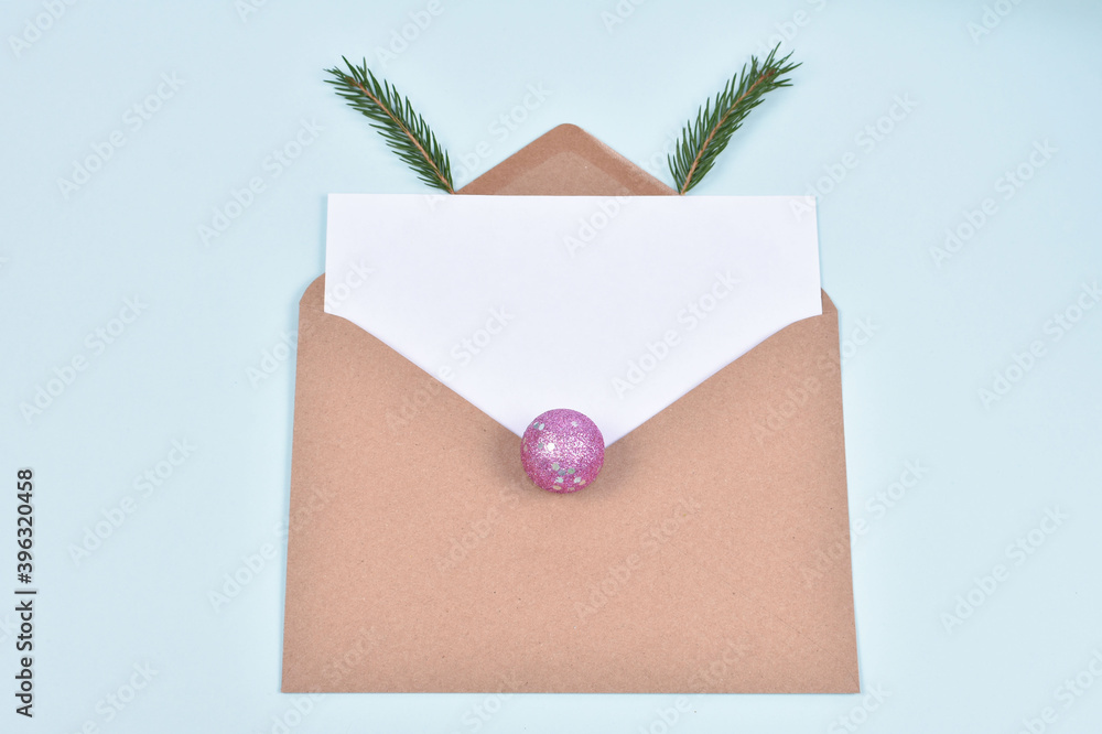 Christmas or New Year wish list, composition on light blue background, concept of deer face made of decorations. Mock-up. Greeting card, flat lay. Write a letter to Santa. Copy space. Christmas or New Year wish list, composition on light blue background, concept of deer face made of decorations. Mock-up. Greeting card, flat lay. Write a letter to Santa. Copy space.