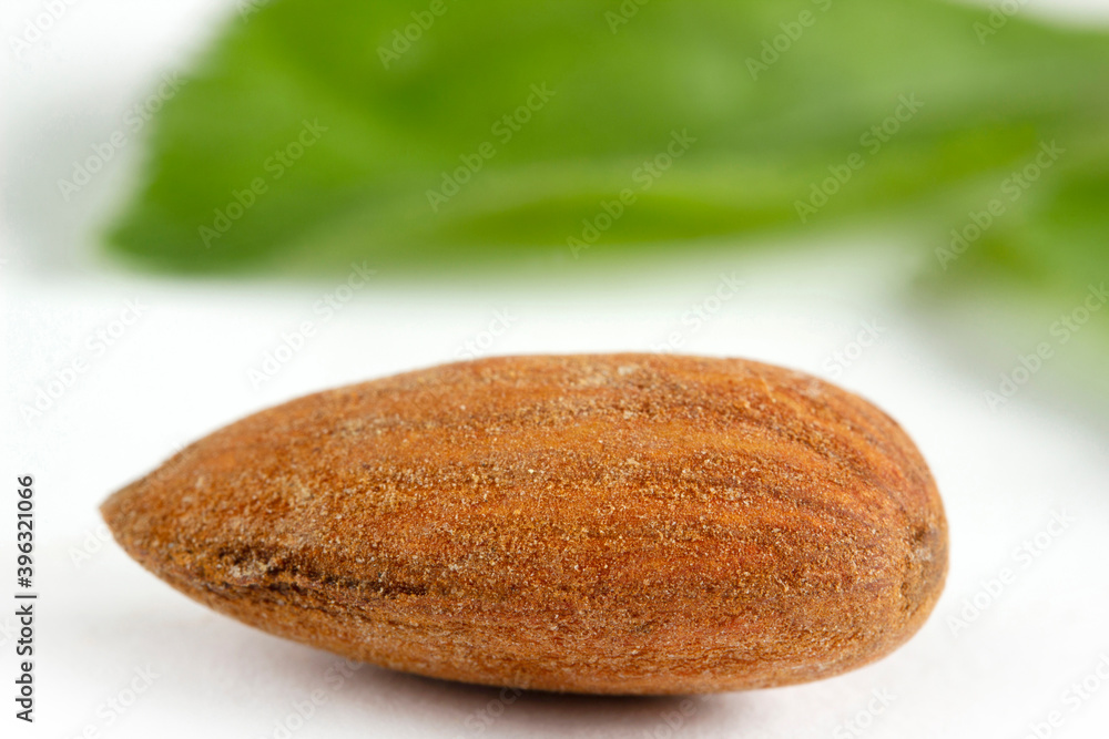 A pile of Almonds, isolated on a white background. A pile of Almonds, isolated on a white background.