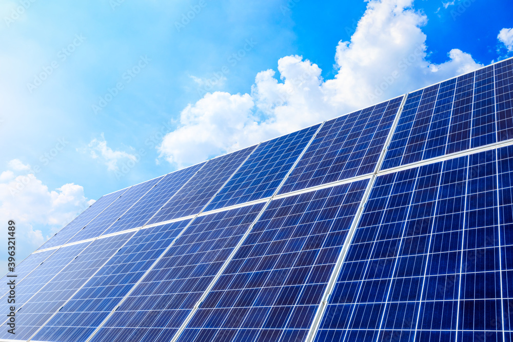 Solar power panels and natural landscape in sunny summer, Asia Solar power panels and natural landscape in sunny summer, Asia