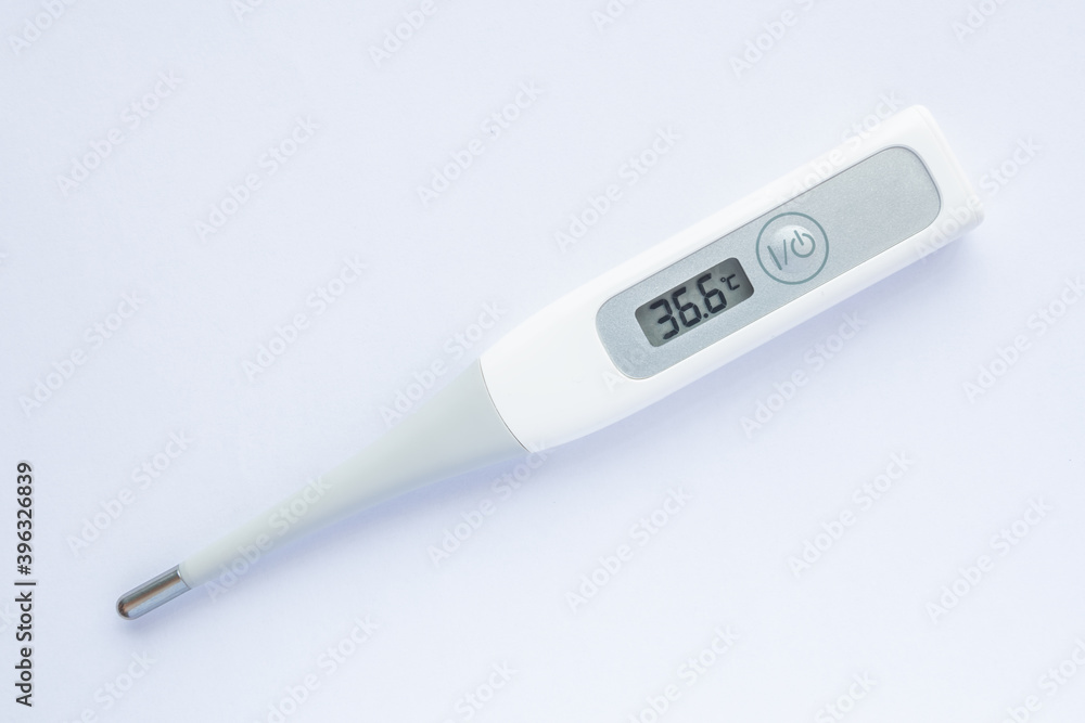 Electronic body thermometer displaying healthy human body temperature 36.6 grades C Electronic body thermometer displaying healthy human body temperature 36.6 grades C