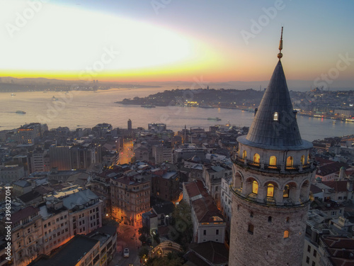 Aerial Galata Tower at Sunset.  Galata Bridge and Golden Horn of Istanbul with beautiful colors at Sunset. 