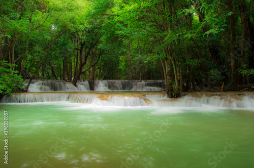 Huay Mae Kamin waterfall in deep rain forest jungle ( Srinakharin Dam National parkl in Kanchanaburi, Thailand) photo
