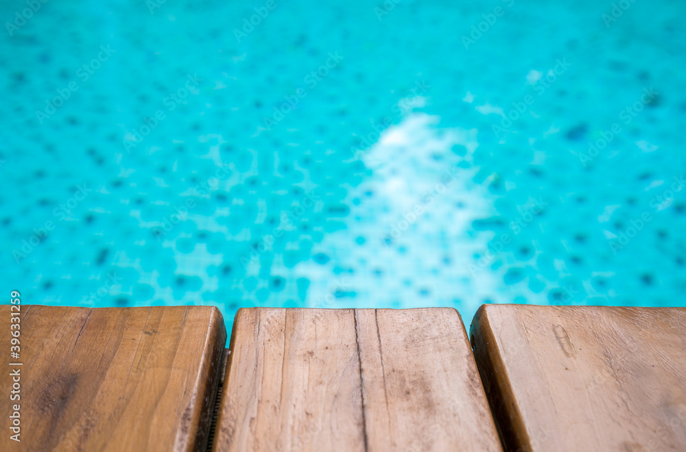 Empty Wooden board on the pool for background