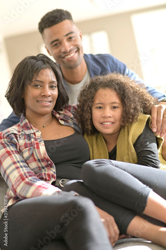 Portrait of happy african-american family of three