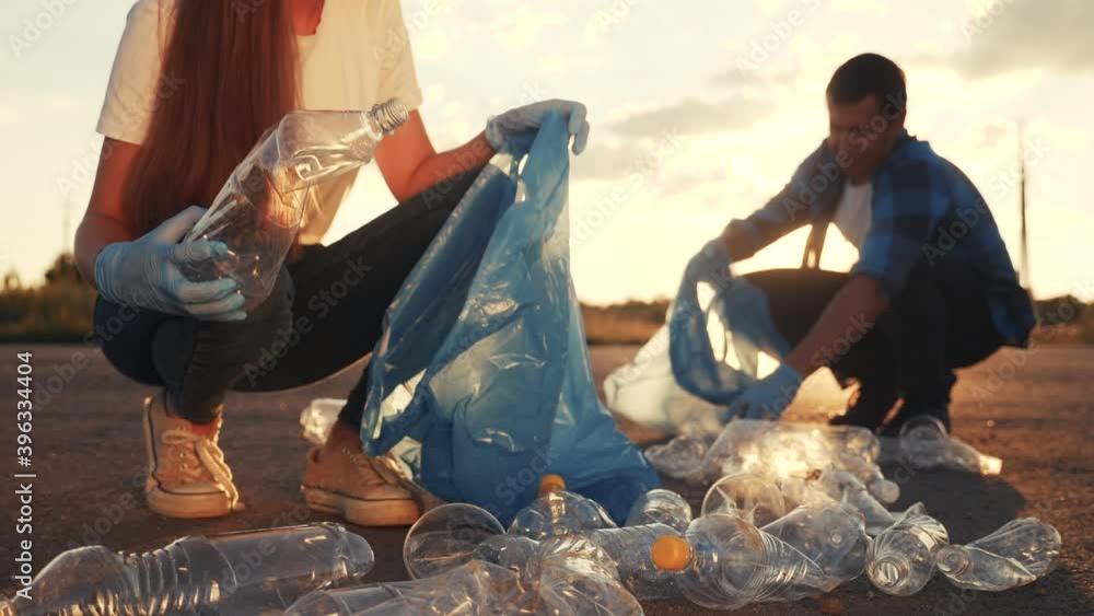 teamwork trash volunteer concept. people group clean on collects garbage plastic trash and paper waste bottles trash. environmental team clean a ecology cleanup teamwork volunteer awareness pollution teamwork trash volunteer concept. people group clean on collects garbage plastic trash and paper waste bottles trash. environmental team clean a ecology cleanup teamwork volunteer awareness pollution