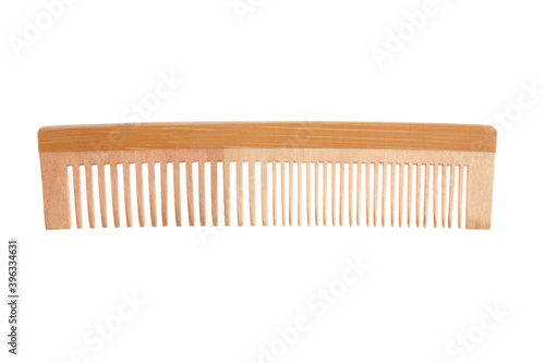 wooden comb isolated on white background with clipping path and copy space for your text