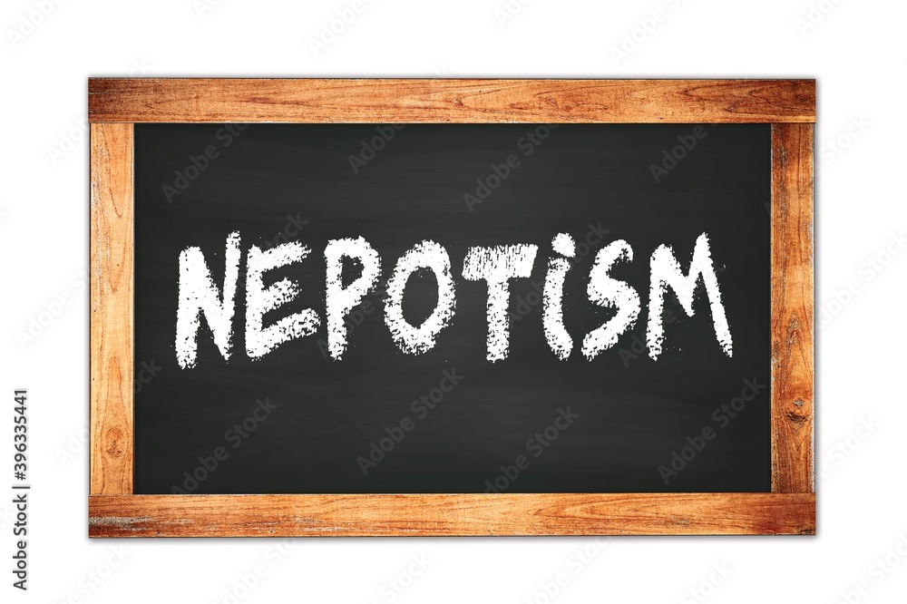NEPOTISM text written on wooden frame school blackboard. NEPOTISM text written on wooden frame school blackboard.