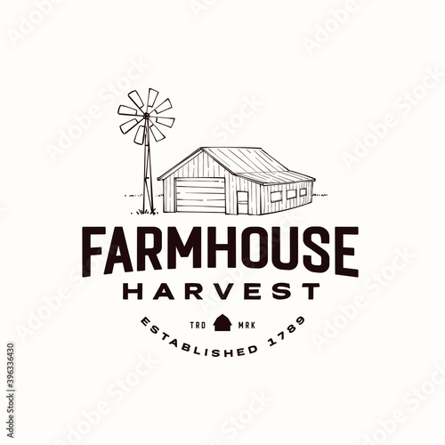 Old barn with windmill vintage logo design template