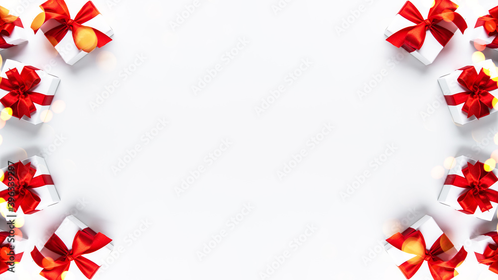 Merry Christmas and Happy Holidays greeting card, frame, banner. New Year. Noel. Red Christmas ornaments and gift on white background top view. Winter xmas holiday theme. Flat lay
Merry Christmas and Happy Holidays greeting card, frame, banner. New Year. Noel. Red Christmas ornaments and gift on white background top view. Winter xmas holiday theme. Flat lay