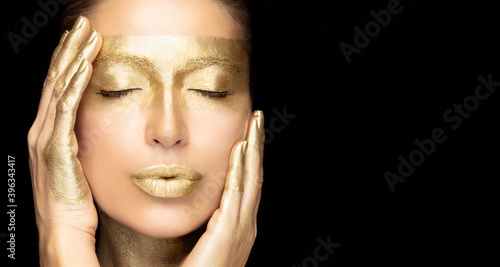 Glowing golden skin woman. 24k gold based spa skincare treatment concept photo